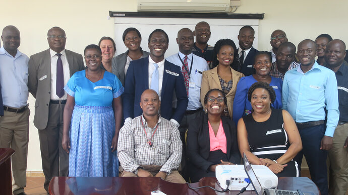 A group of smiling men and women