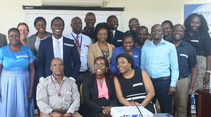 A group of smiling men and women